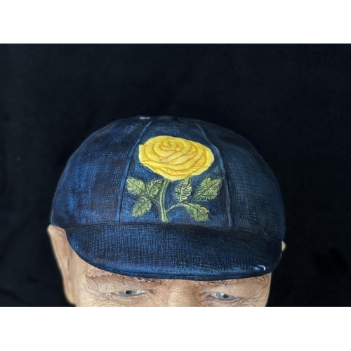 75 - A 1995 Bossons Cricketer dark blue cap with yellow rose version chalkware head wall mask - approx. 1... 