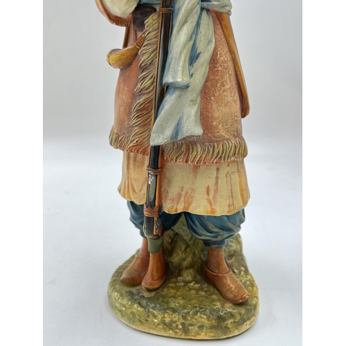 91 - A Bossons Afghan with blue belt chalkware shelf ornament figurine, specially painted to be displayed... 