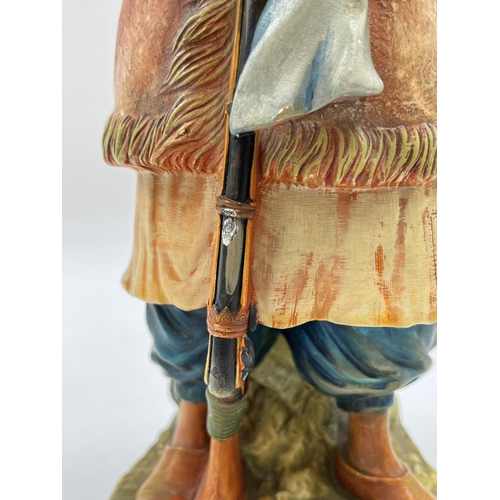 91 - A Bossons Afghan with blue belt chalkware shelf ornament figurine, specially painted to be displayed... 