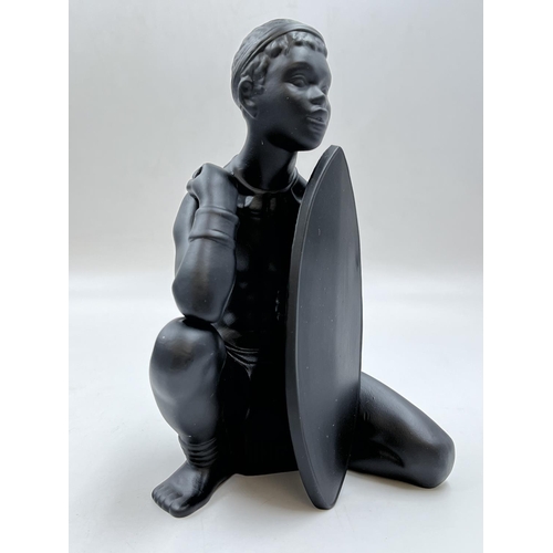 94 - A boxed Bossons African Man black painted pottery figurine - approx. 20cm high