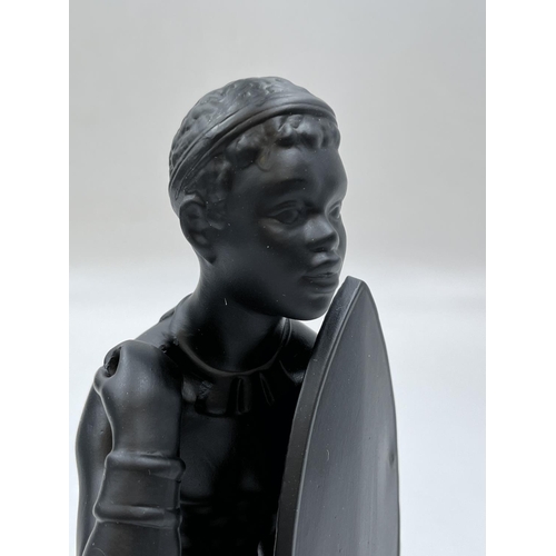 94 - A boxed Bossons African Man black painted pottery figurine - approx. 20cm high