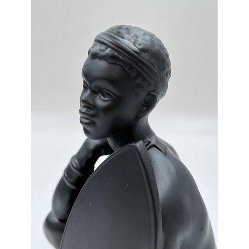 94 - A boxed Bossons African Man black painted pottery figurine - approx. 20cm high