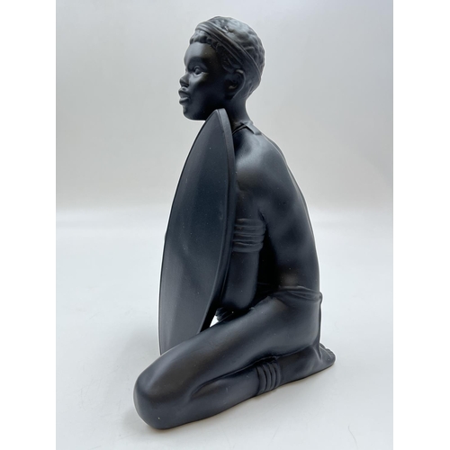 94 - A boxed Bossons African Man black painted pottery figurine - approx. 20cm high