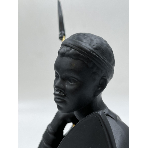 95 - A boxed Bossons African Man black painted pottery figurine - approx. 26cm high