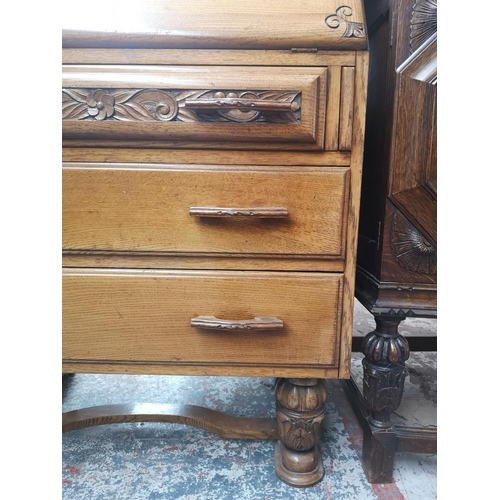 351 - A mid 20th century carved oak bureau with three drawers, fall front and baluster supports - approx. ... 