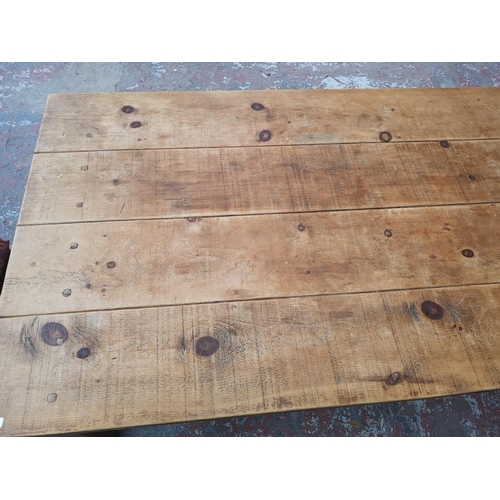 355 - A solid pine rectangular farmhouse dining table - approx. 78cm high x 120cm wide x 213cm long