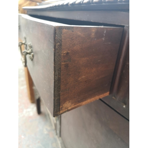 360 - A Georgian style mahogany sideboard with two drawers and three cupboard doors - approx. 97cm high x ... 