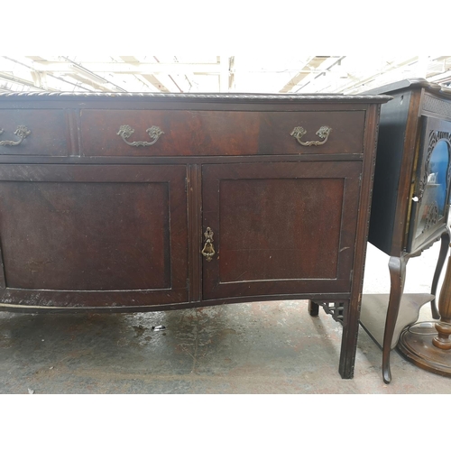 360 - A Georgian style mahogany sideboard with two drawers and three cupboard doors - approx. 97cm high x ... 