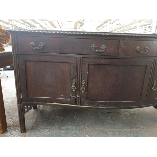 360 - A Georgian style mahogany sideboard with two drawers and three cupboard doors - approx. 97cm high x ... 