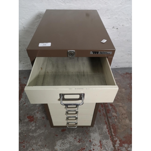 372 - A Matthews brown and cream metal eight drawer office filing cabinet - approx. 68cm high x 28cm wide ... 