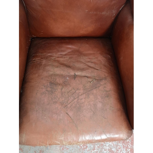 376 - An early/mid 20th century brown leather armchair - approx. 89cm high x 79cm wide x 76cm deep