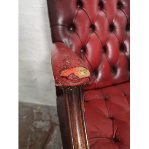 377 - Two items, one red leather Chesterfield style swivel office desk chair - approx. 99cm high x 60cm wi... 