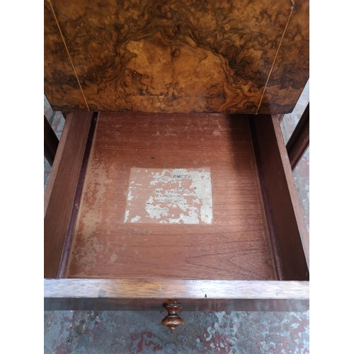 384 - A Victorian inlaid burr walnut sewing table with black leather insert and two lower drawers - approx... 