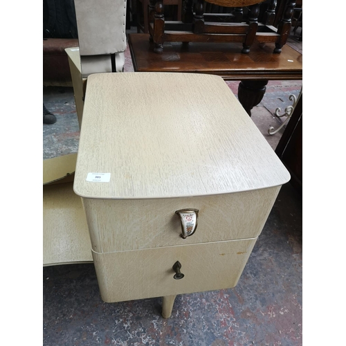 385 - A mid 20th century limed oak dressing table - approx. 145cm high x 130cm wide x 50cm deep