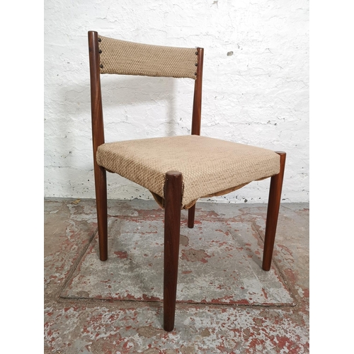 386 - A set of four mid 20th century teak and brown upholstered dining chairs