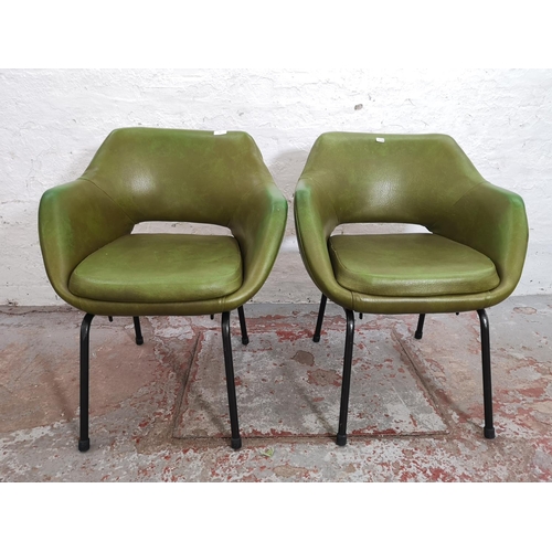 387 - A pair of mid 20th century green vinyl and black tubular metal dining chairs