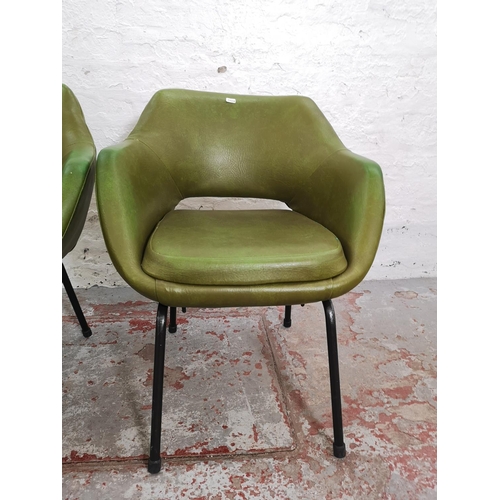 387 - A pair of mid 20th century green vinyl and black tubular metal dining chairs