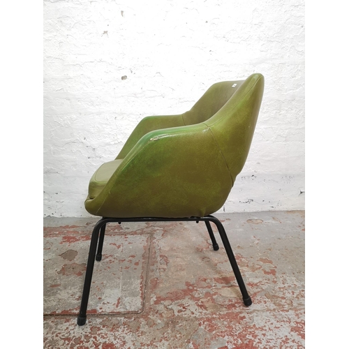 387 - A pair of mid 20th century green vinyl and black tubular metal dining chairs