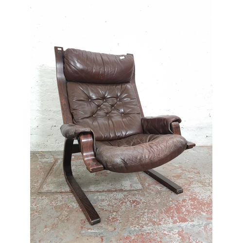 389 - A bentwood and brown leatherette armchair and matching stool