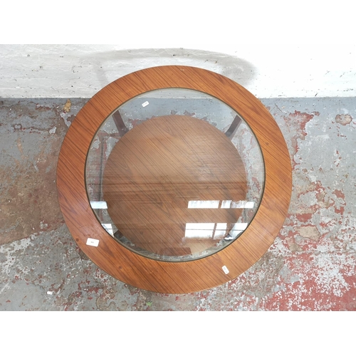 400 - A teak effect and glass two tier circular coffee table - approx. 45cm high x 84cm in diameter