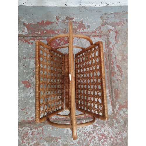 410 - A mid 20th century bamboo and rattan two section magazine rack - approx. 48cm high x 30cm wide x 39c... 