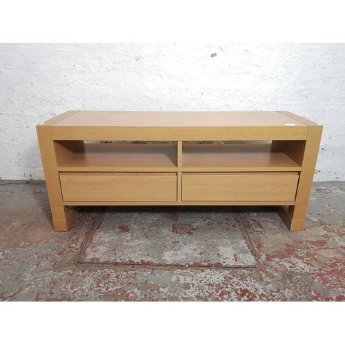 420 - A modern oak effect tv stand with two drawers - approx. 50cm high x 117cm wide x 39cm deep