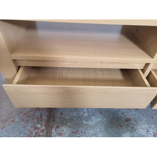 420 - A modern oak effect tv stand with two drawers - approx. 50cm high x 117cm wide x 39cm deep