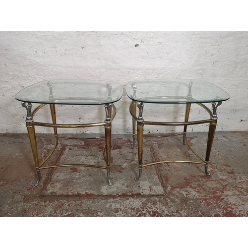 424 - A pair of brass and chrome plated side tables, both having bevelled glass tops and swan design - app... 