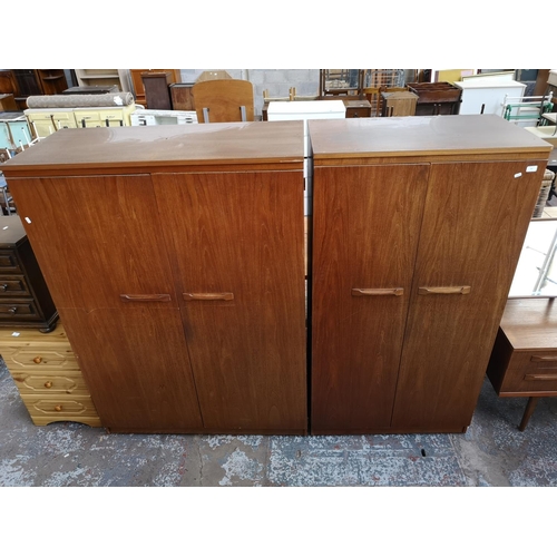 428 - Two Austinsuite teak double wardrobes - approx. 171cm high x 91cm wide x 57cm deep