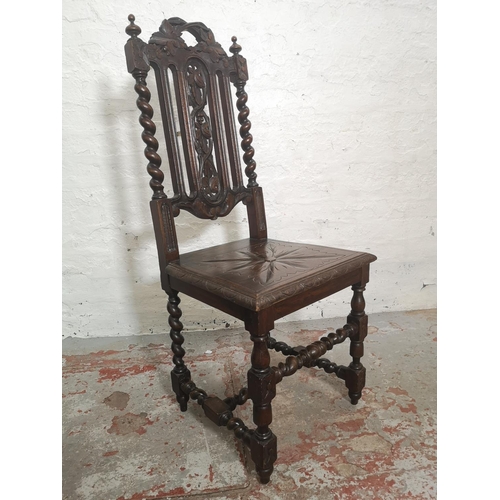 437 - Two 19th century heavily carved oak dining chairs with barley twist design