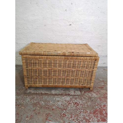 439 - A modern wicker twin handled basket - approx. 52cm high x 90cm wide x 51cm deep