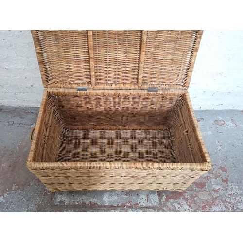 439 - A modern wicker twin handled basket - approx. 52cm high x 90cm wide x 51cm deep