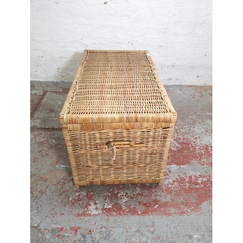 439 - A modern wicker twin handled basket - approx. 52cm high x 90cm wide x 51cm deep