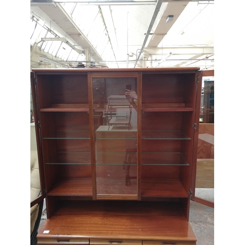 440 - An Avalon teak display cabinet - approx. 172cm high x 113cm wide x 47cm deep