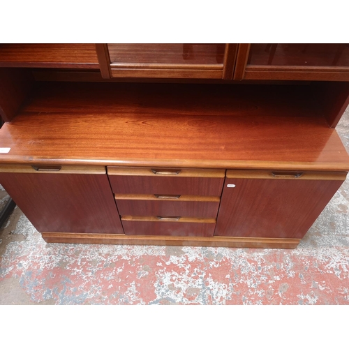 440 - An Avalon teak display cabinet - approx. 172cm high x 113cm wide x 47cm deep