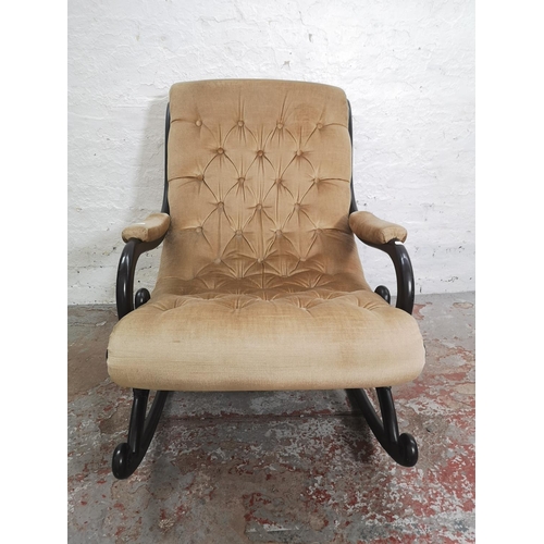 441 - A modern brown painted and beige upholstered slipper rocking chair - approx. 93cm high x 68cm wide x... 