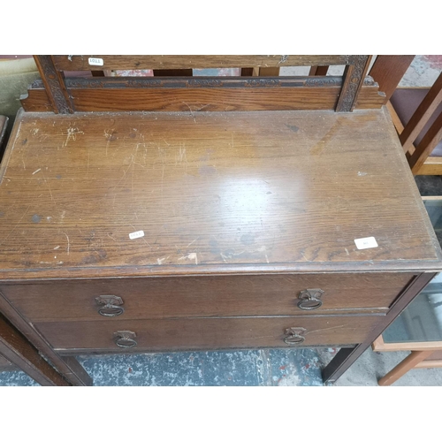 461 - Two pieces of 1930s oak furniture, one chest of two drawers and one dressing chest with upper mirror