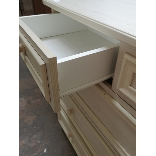 479 - A modern white laminate chest of two short over three long drawers with matching cabinet - chest of ... 