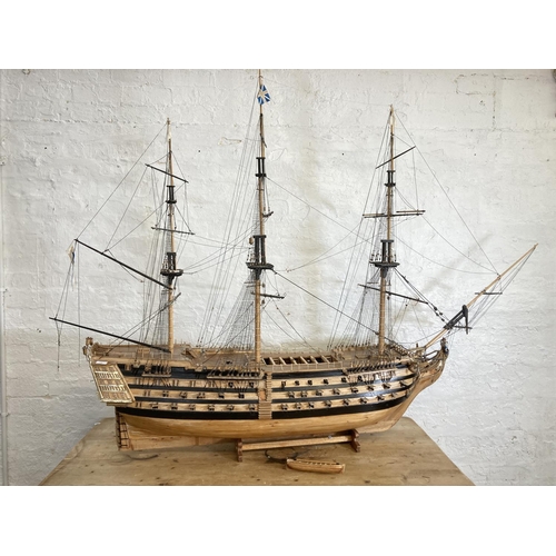 148 - A large scratch built wooden three mast model of The Victory ship on plinth - approx. 150cm high x 2... 