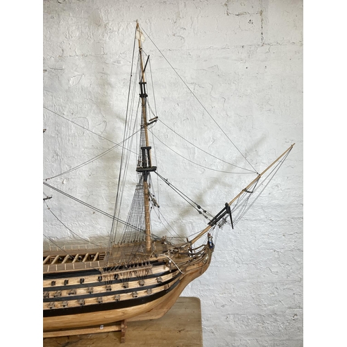 148 - A large scratch built wooden three mast model of The Victory ship on plinth - approx. 150cm high x 2... 