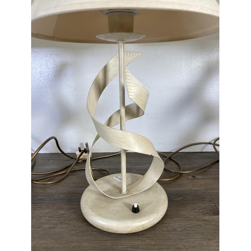 308 - Three modern painted metal table lamps with ribbon design - approx. 50cm high including shade