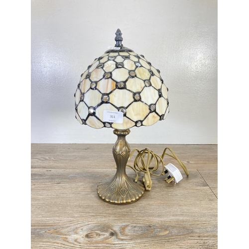 311 - A Tiffany style table lamp - approx. 38cm high