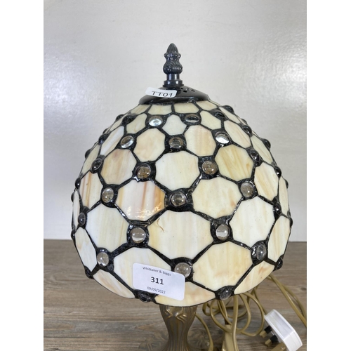 311 - A Tiffany style table lamp - approx. 38cm high