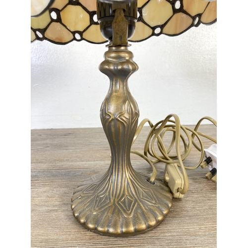 311 - A Tiffany style table lamp - approx. 38cm high