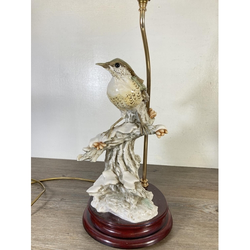 314 - Two 1984 Capodimonte figural table lamps with bird design - approx. 52cm high including bulb holder