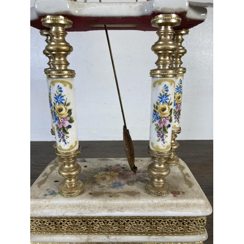 321 - An Alfa gilt metal and porcelain quartz mantel clock with pendulum - approx. 48cm high