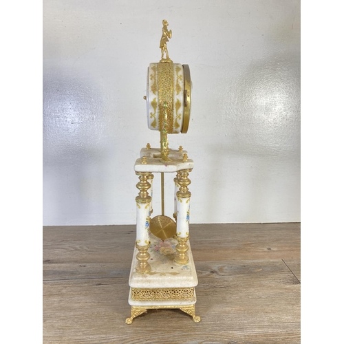 321 - An Alfa gilt metal and porcelain quartz mantel clock with pendulum - approx. 48cm high