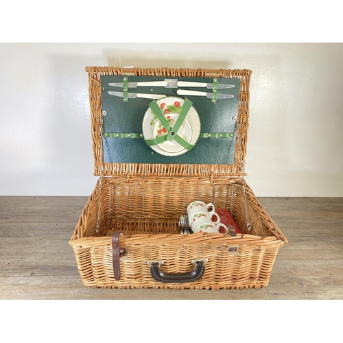 324 - An Antler wicker picnic basket with contents