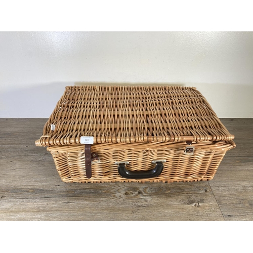 324 - An Antler wicker picnic basket with contents