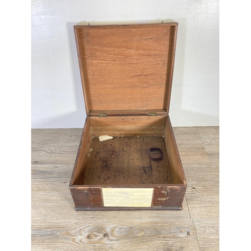 325 - An early 20th century oak lidded box - approx. 14cm high x 33cm wide x 34cm deep